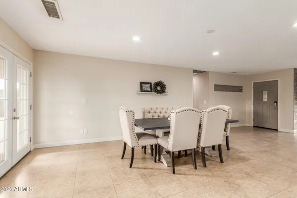 a view of a dining room with furniture