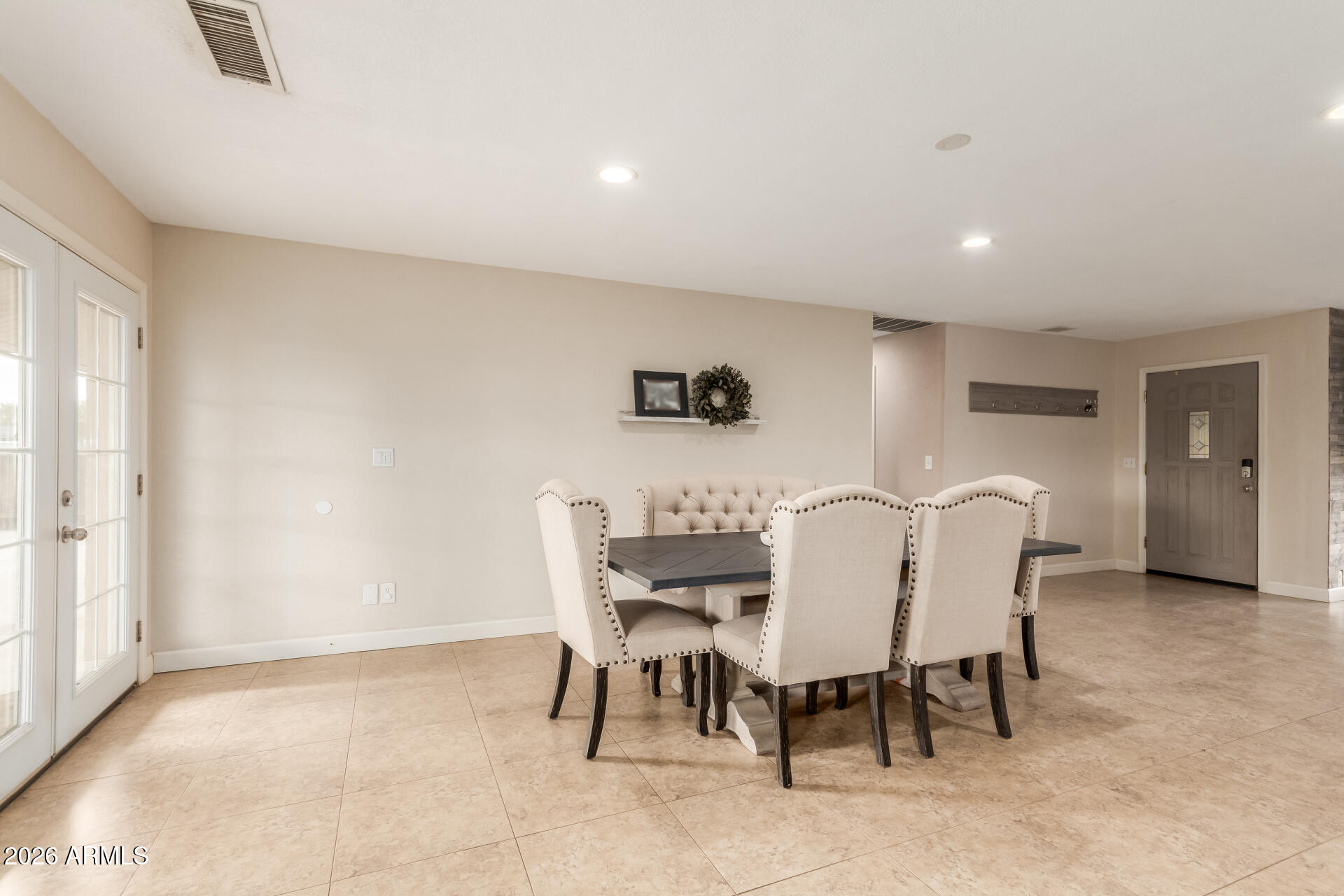 313 West Saddle Mountain Road Phoenix, AZ 85086 - Photo 11 of 54 a view of a dining room with furniture