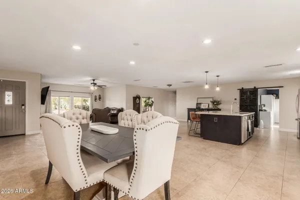 a view of a dining room with furniture