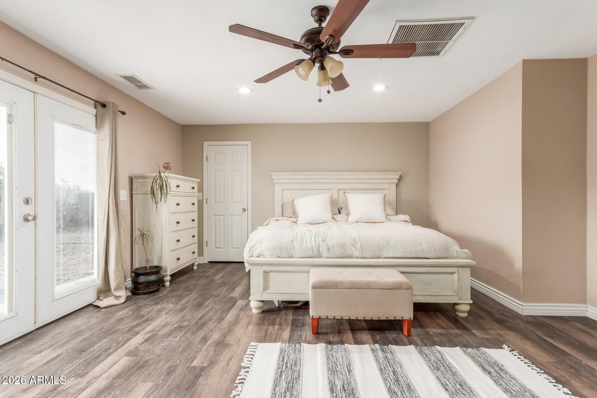 313 West Saddle Mountain Road Phoenix, AZ 85086 - Photo 23 of 54 a bedroom with a bed and a table