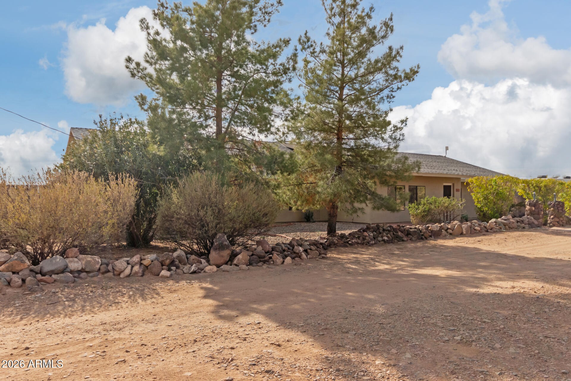 313 West Saddle Mountain Road Phoenix, AZ 85086 - Photo 4 of 54 a view of a street with a building in the background