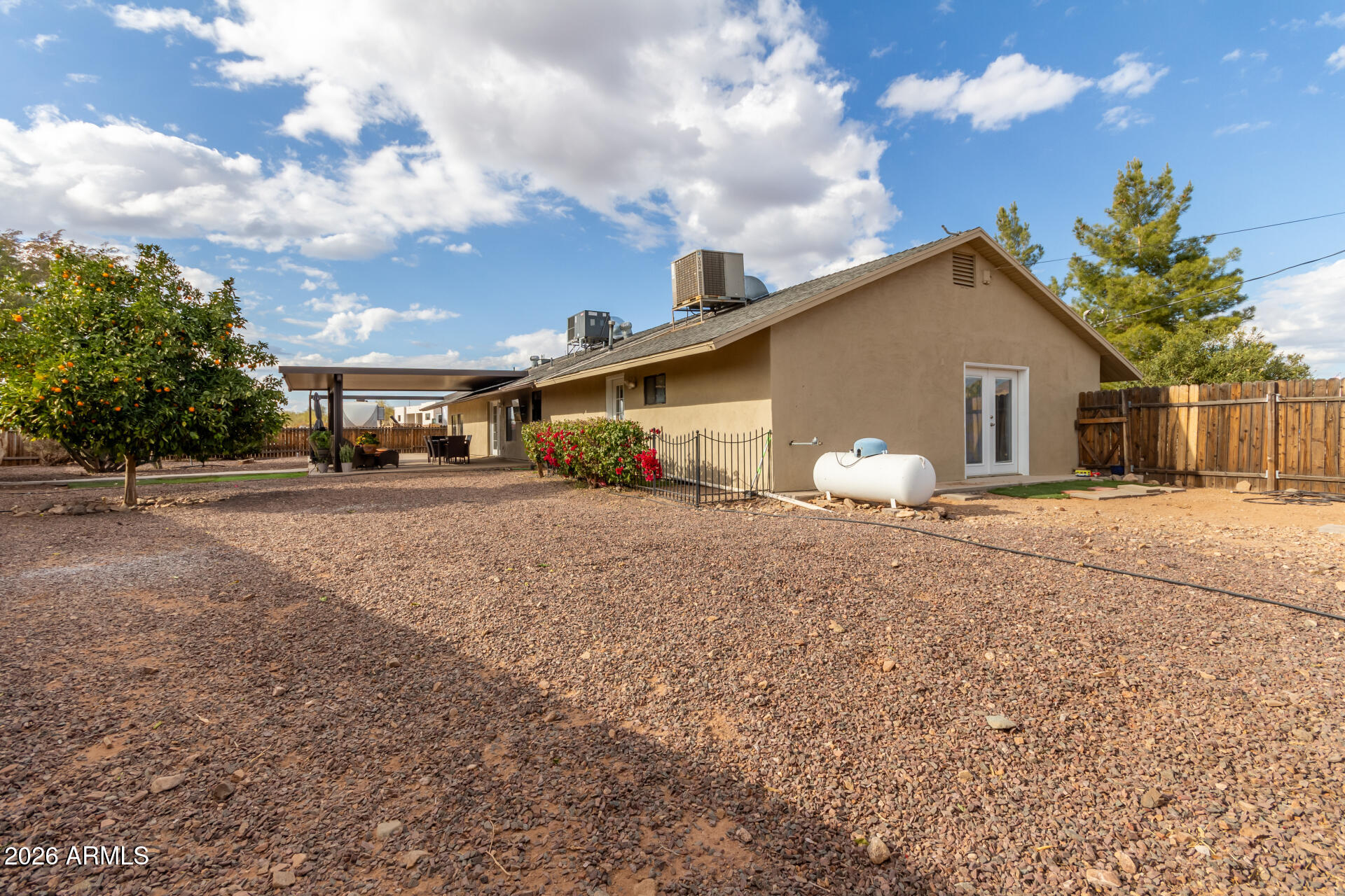 313 West Saddle Mountain Road Phoenix, AZ 85086 - Photo 43 of 54 a view of a house with a yard