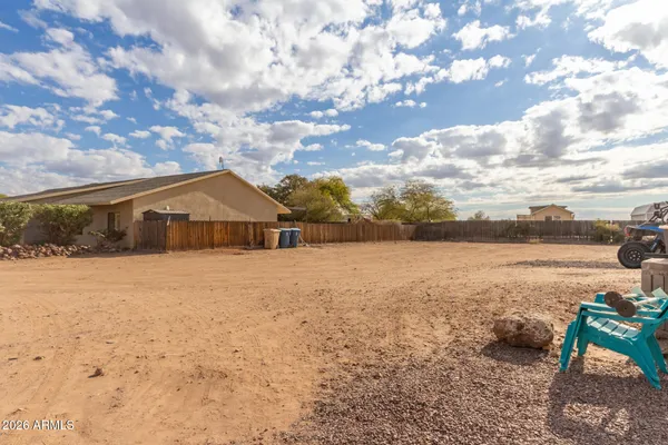 a view of a lake with beach and city view