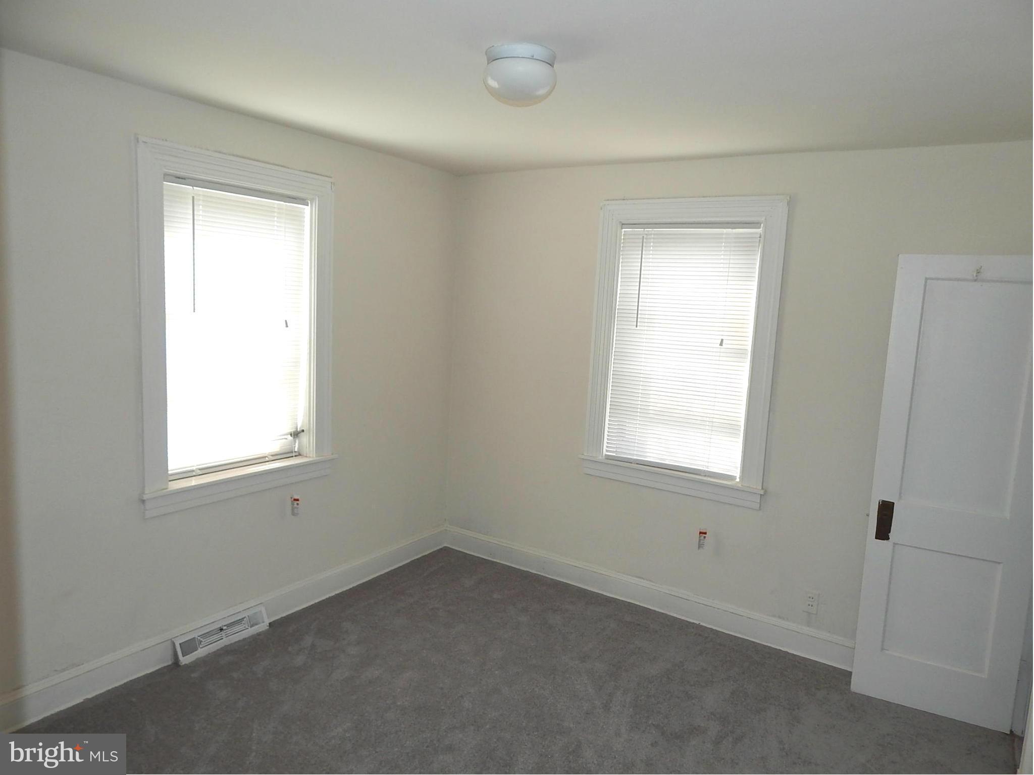 12 Crafton Road Baltimore, MD 21221 - Photo 11 of 28 an empty room with a window