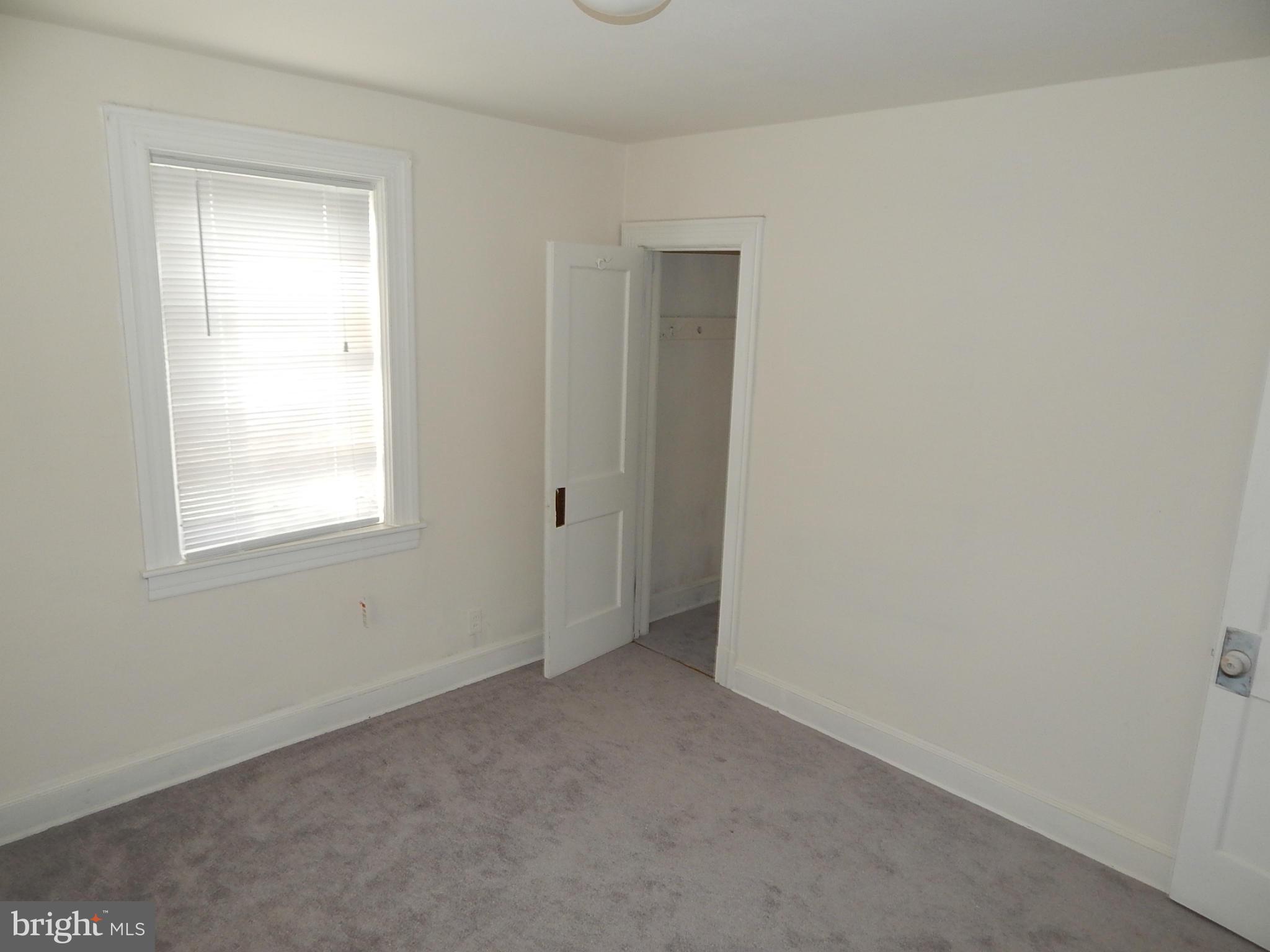 12 Crafton Road Baltimore, MD 21221 - Photo 12 of 28 a view of an empty room with a window