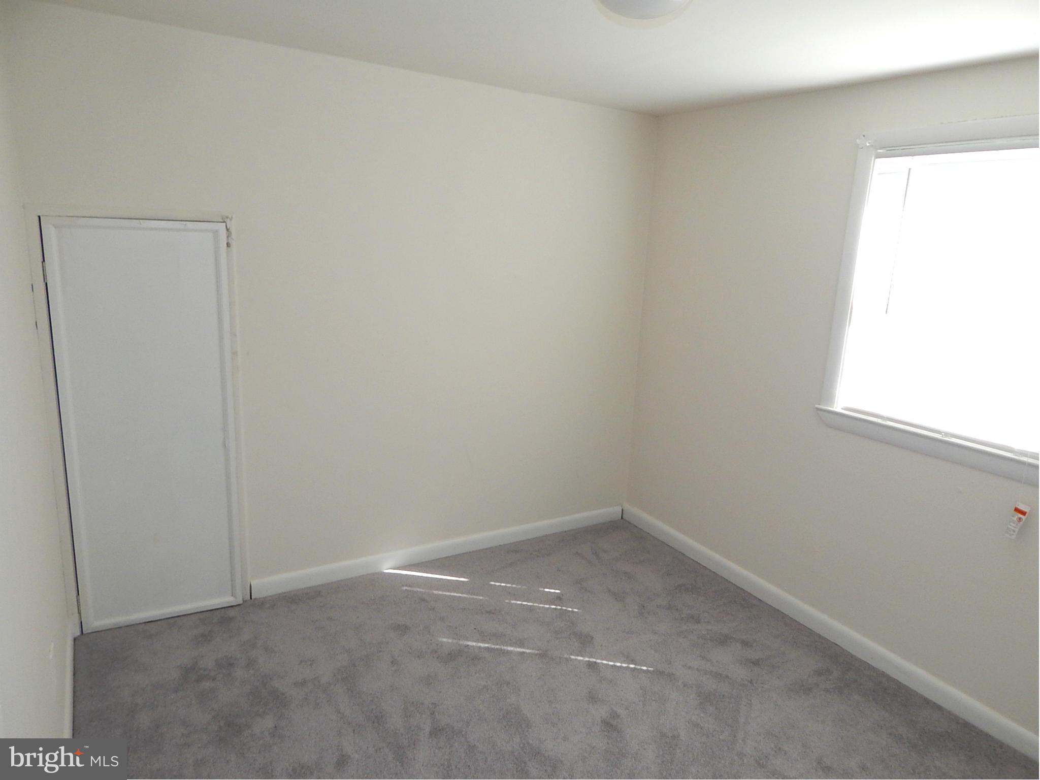 12 Crafton Road Baltimore, MD 21221 - Photo 20 of 28 an empty room with a window
