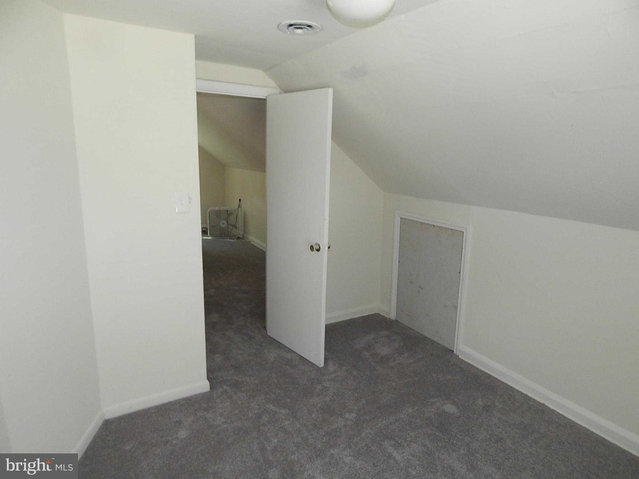 12 Crafton Road Baltimore, MD 21221 - Photo 23 of 28 an empty room with an entrance to other room
