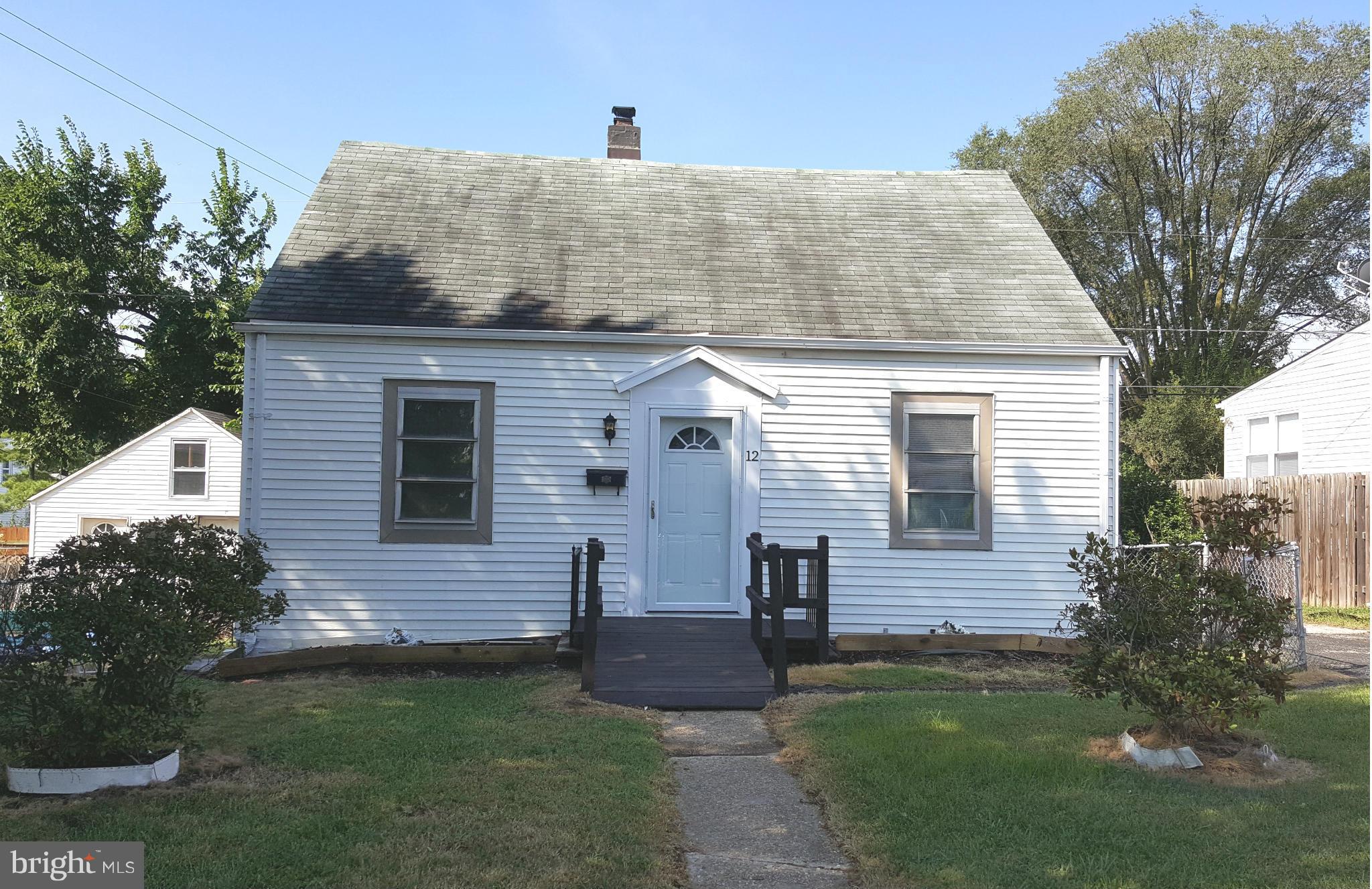 12 Crafton Road Baltimore, MD 21221 - Photo 28 of 28 a front view of a house with garden