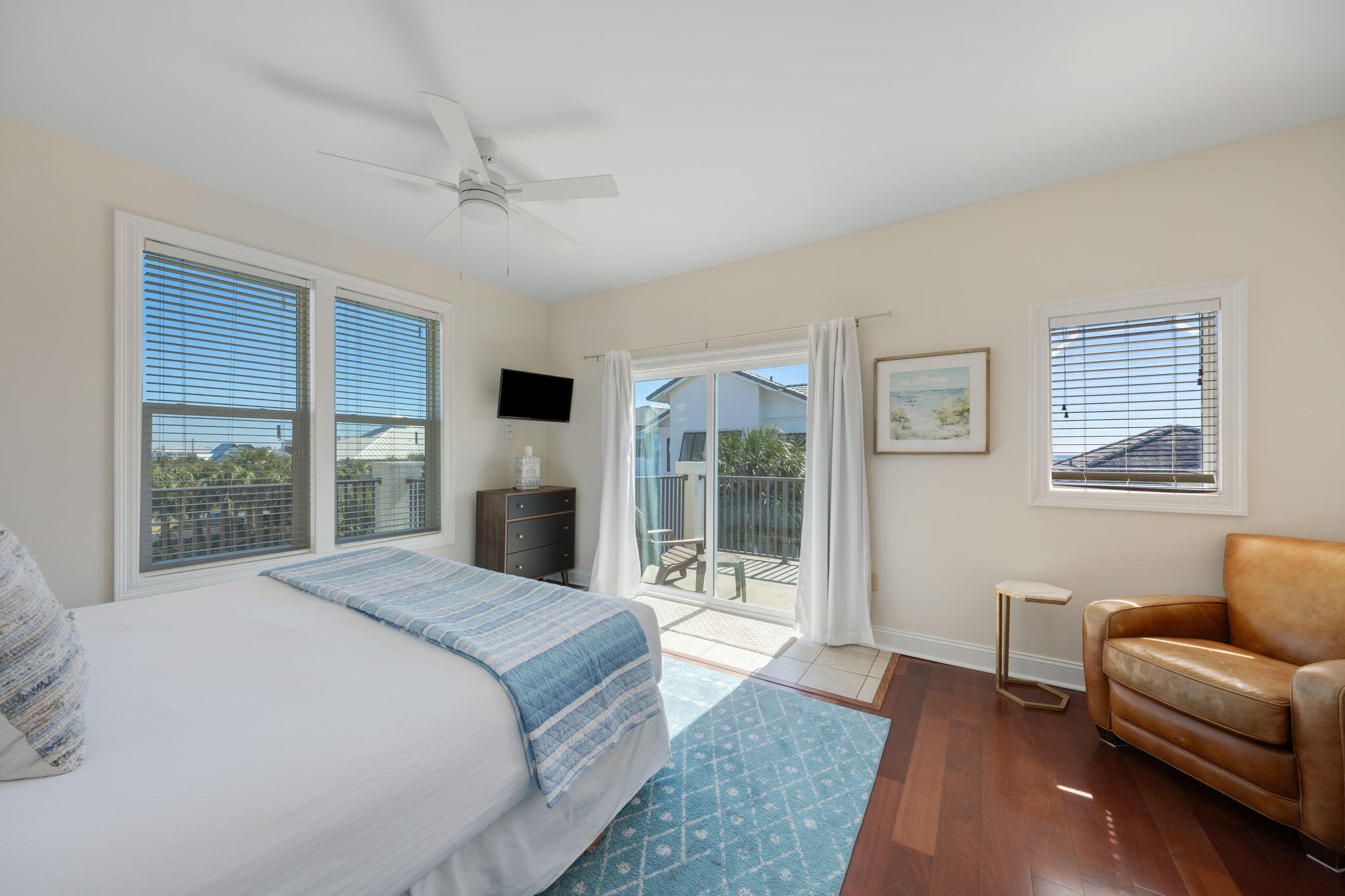 44 South Grande Beach Drive Santa Rosa Beach, FL 32459 - Photo 36 of 68 a spacious bedroom with a large bed and a couch