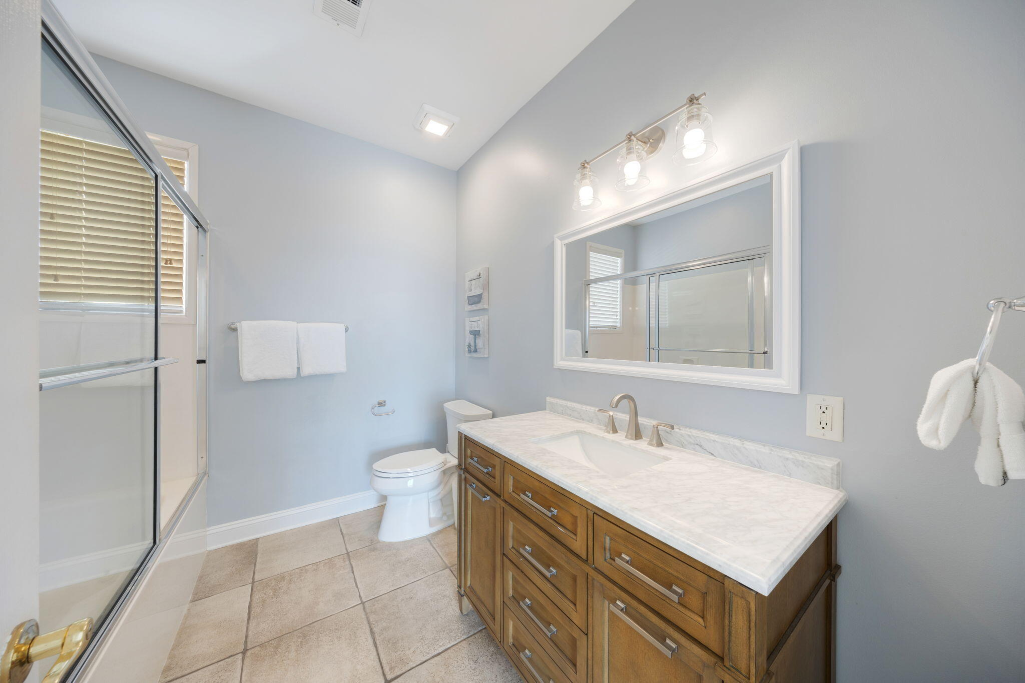 44 South Grande Beach Drive Santa Rosa Beach, FL 32459 - Photo 41 of 68 a bathroom with a sink a toilet and mirror