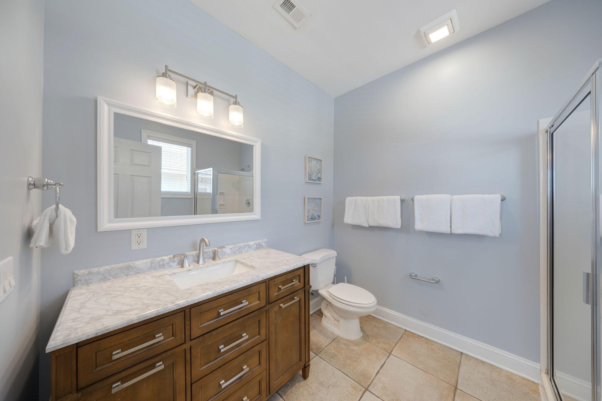 44 South Grande Beach Drive Santa Rosa Beach, FL 32459 - Photo 49 of 68 a bathroom with a granite countertop sink a toilet and a mirror