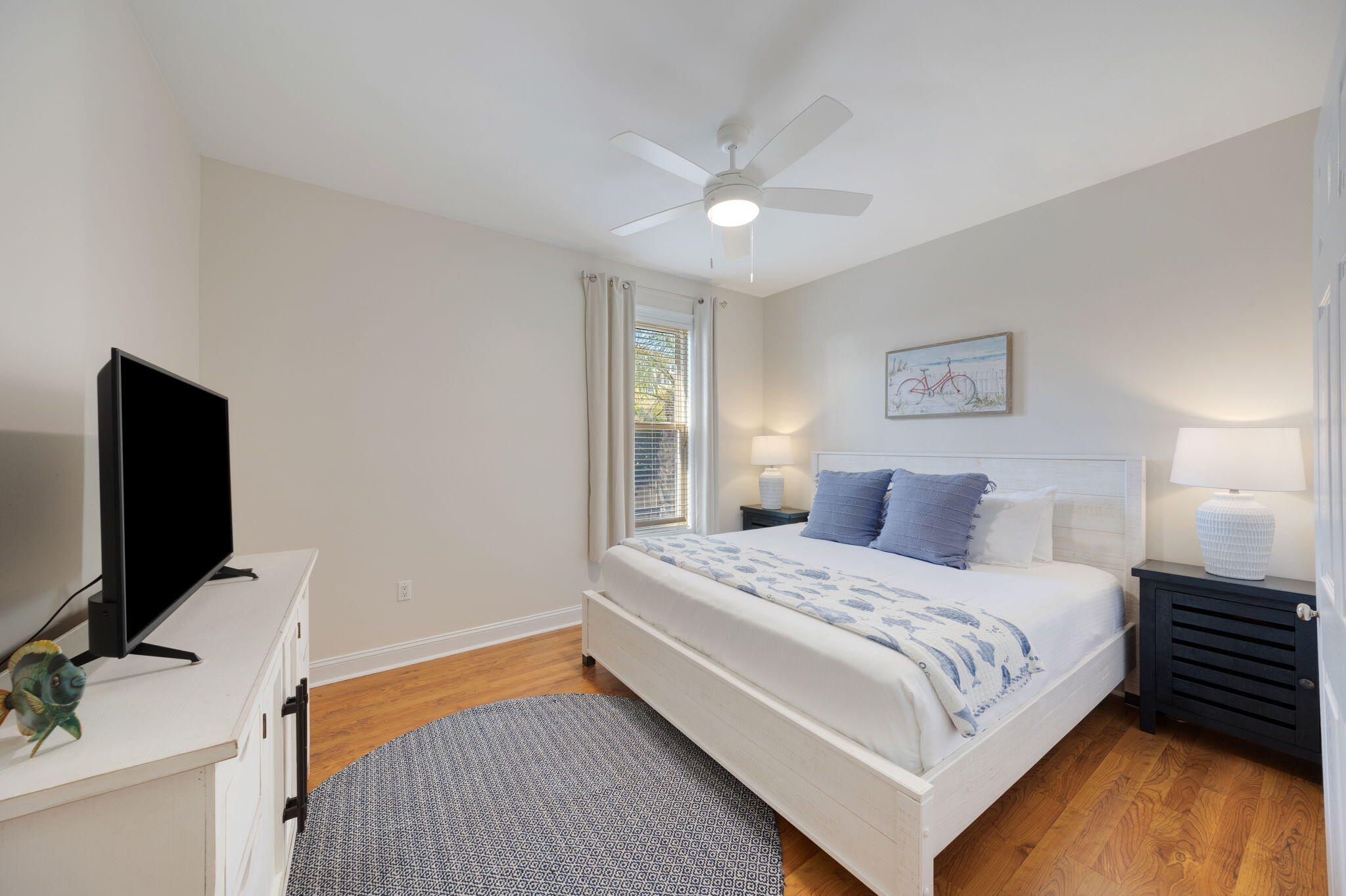 44 South Grande Beach Drive Santa Rosa Beach, FL 32459 - Photo 52 of 68 a bedroom with a bed and a flat screen tv