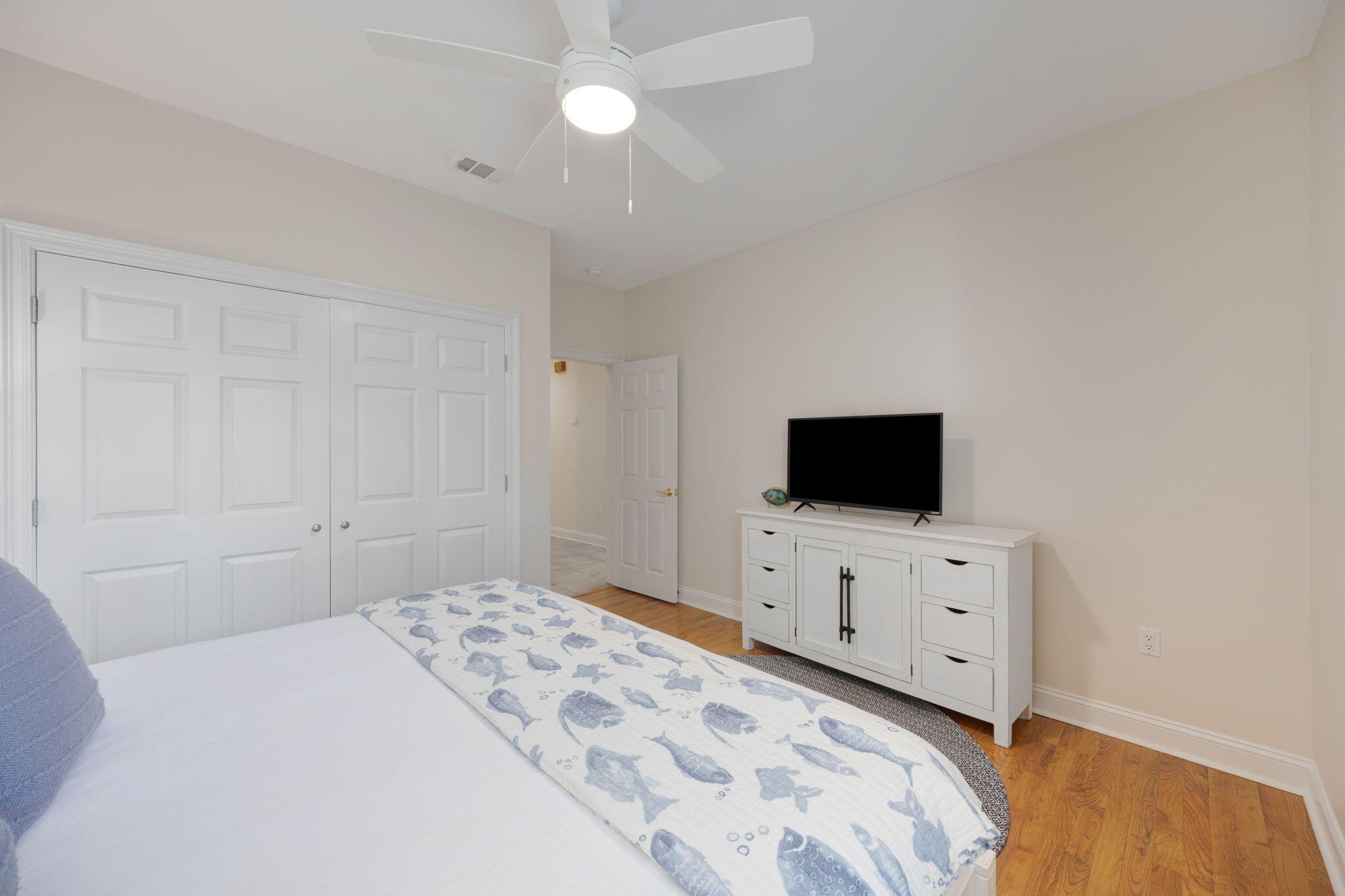 44 South Grande Beach Drive Santa Rosa Beach, FL 32459 - Photo 53 of 68 a bedroom with a bed and a flat screen tv