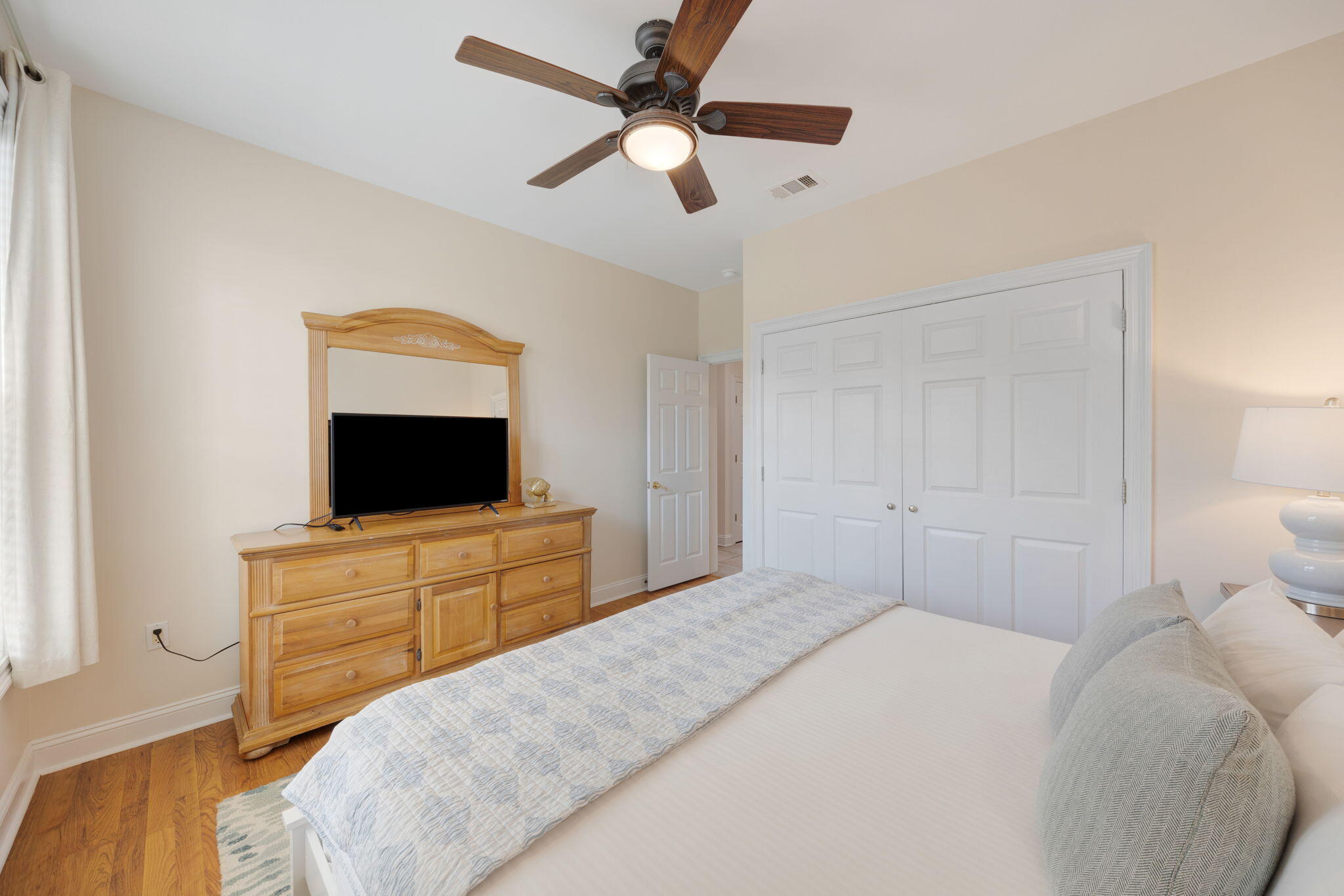 44 South Grande Beach Drive Santa Rosa Beach, FL 32459 - Photo 55 of 68 a bedroom with a bed and a flat screen tv