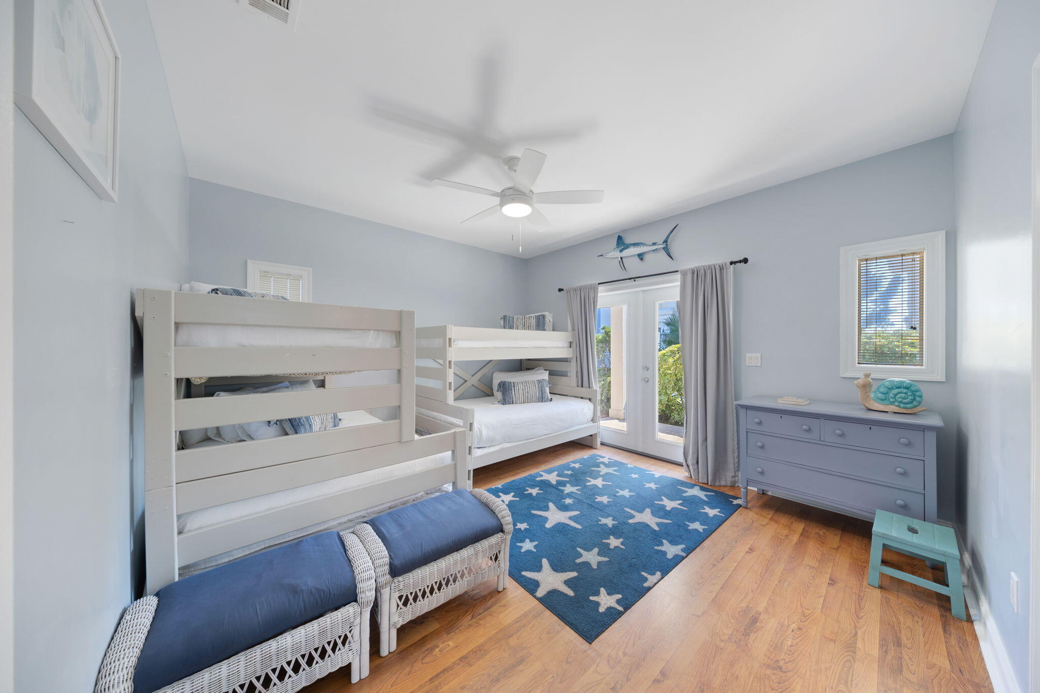 44 South Grande Beach Drive Santa Rosa Beach, FL 32459 - Photo 57 of 68 a bedroom with furniture and a wooden floor