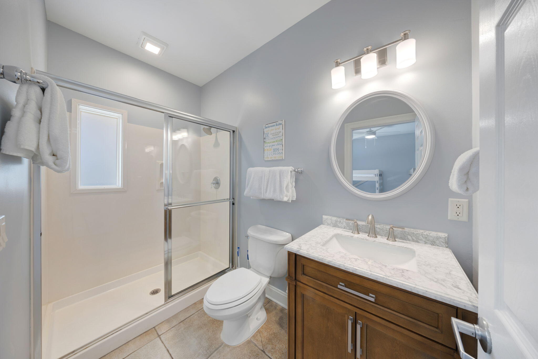 44 South Grande Beach Drive Santa Rosa Beach, FL 32459 - Photo 59 of 68 a bathroom with a sink a toilet a mirror and a shower