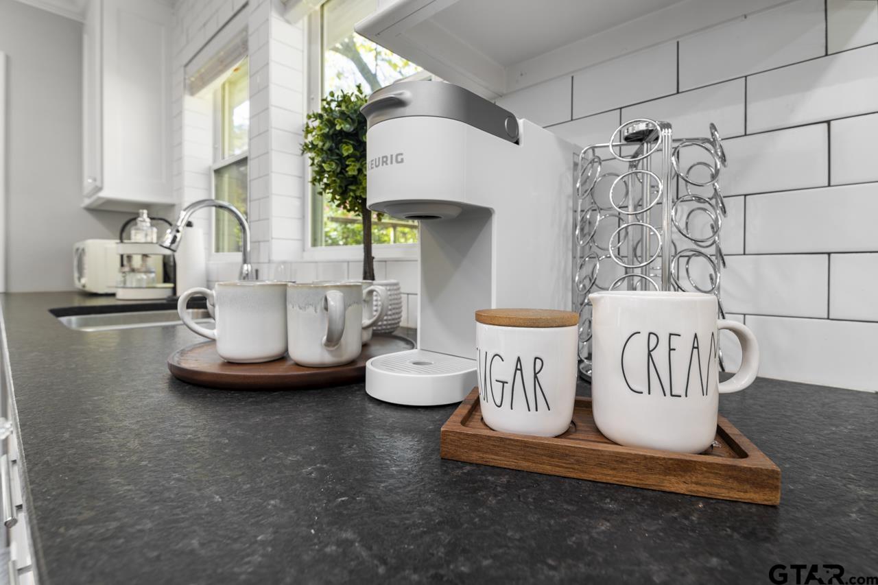 403 East Houston Street Tyler, TX 75701 - Photo 14 of 44 a view of a room with window and couch