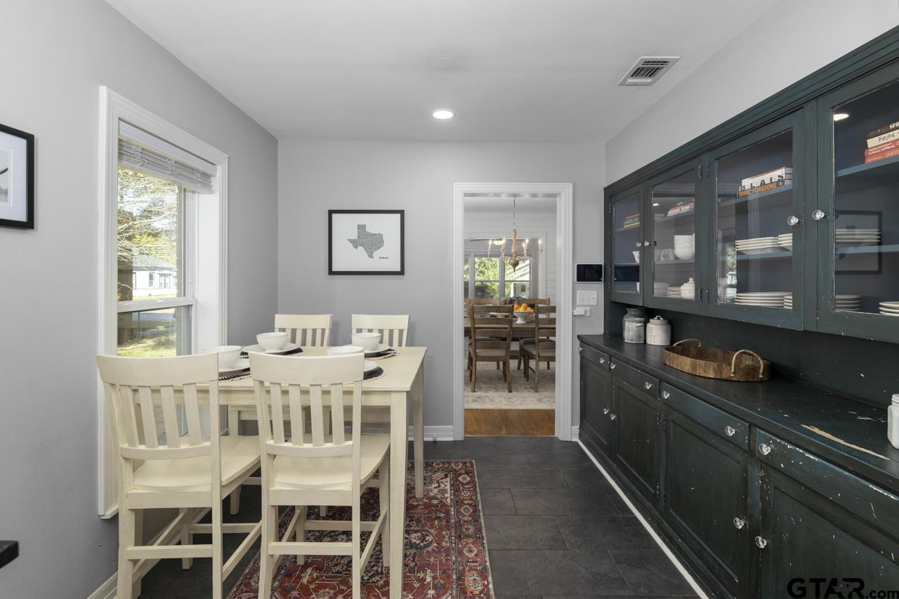 403 East Houston Street Tyler, TX 75701 - Photo 18 of 44 a dining room with furniture and window