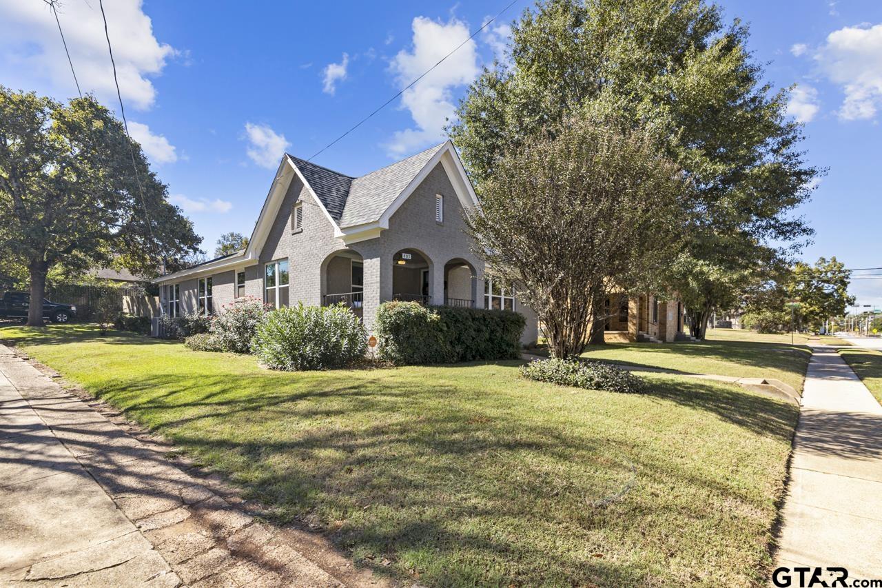 403 East Houston Street Tyler, TX 75701 - Photo 2 of 44 a house that has a big yard with large trees