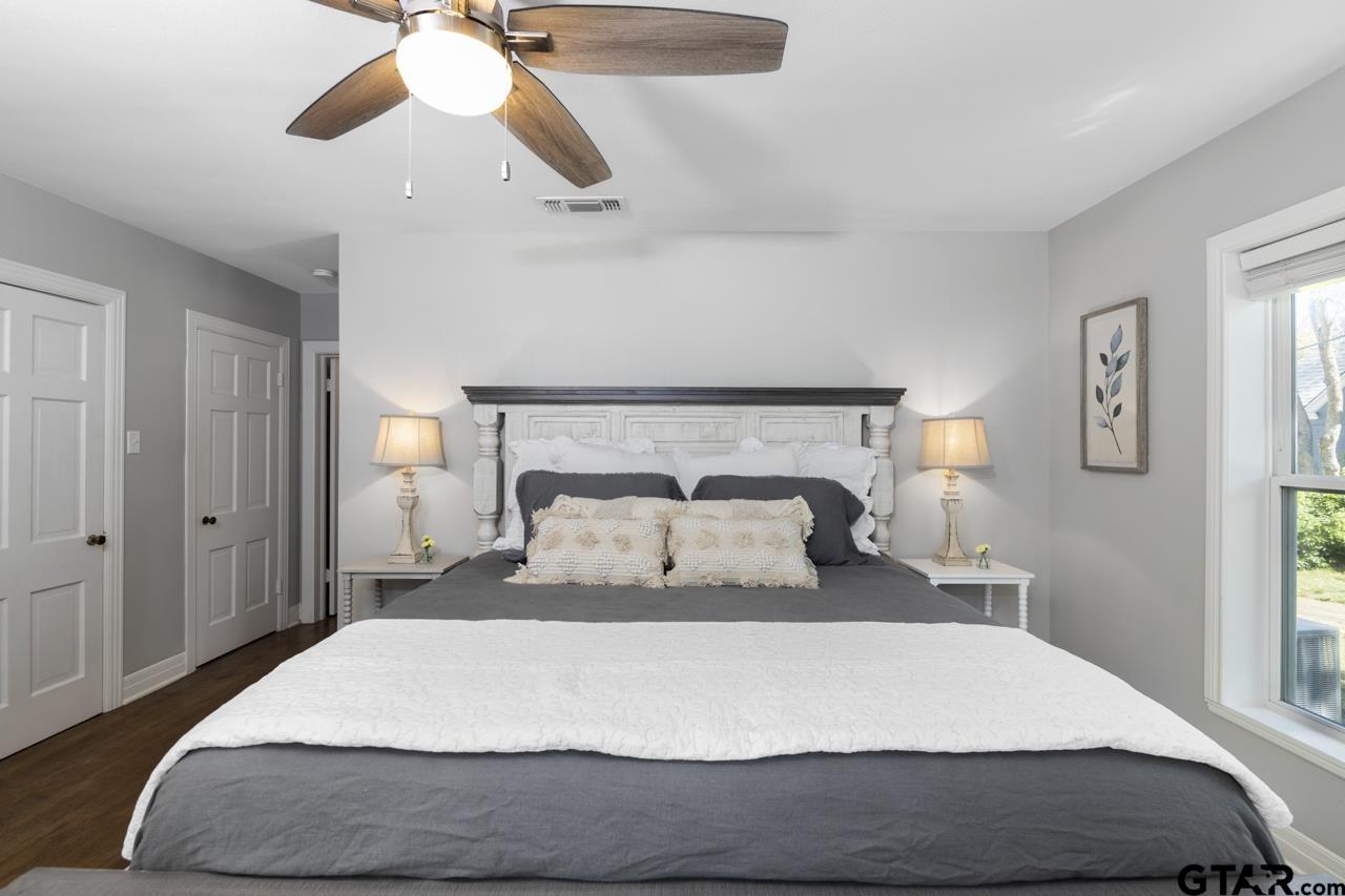 403 East Houston Street Tyler, TX 75701 - Photo 30 of 44 a bedroom with a bed and window
