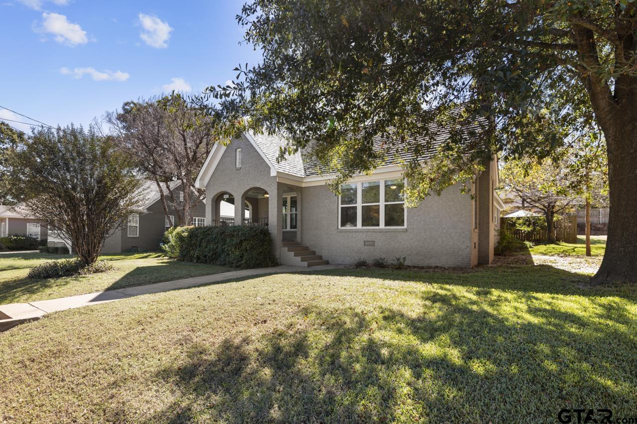 403 East Houston Street Tyler, TX 75701 - Photo 3 of 44 a front view of a house with a yard