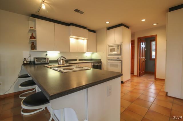 1205 Seifert Road Nazareth, PA 18064 - Photo 17 of 50 a kitchen with a sink appliances and cabinets