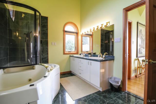 1205 Seifert Road Nazareth, PA 18064 - Photo 23 of 50 a bathroom with a granite countertop tub sink and mirror