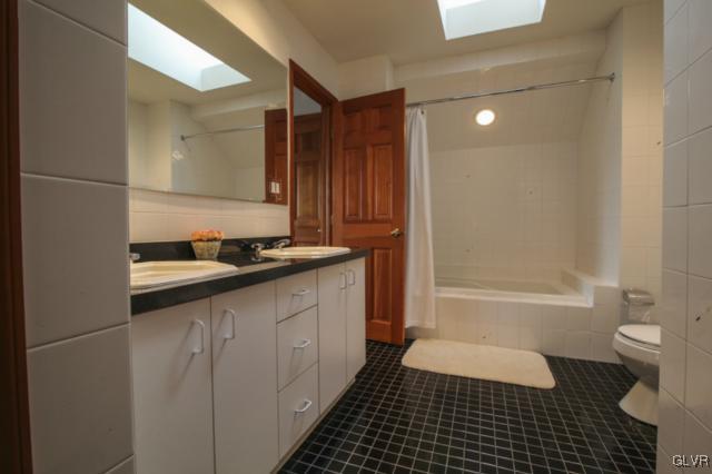 1205 Seifert Road Nazareth, PA 18064 - Photo 32 of 50 a bathroom with a bathtub and a toilet