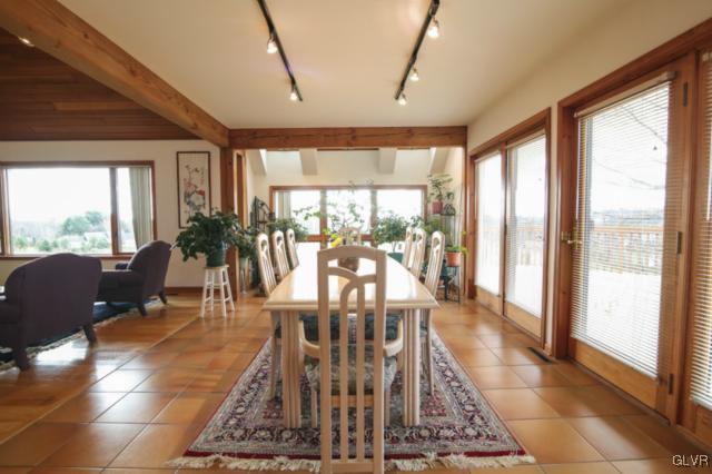 1205 Seifert Road Nazareth, PA 18064 - Photo 6 of 50 a view of a dining room with furniture wooden floor and a chandelier
