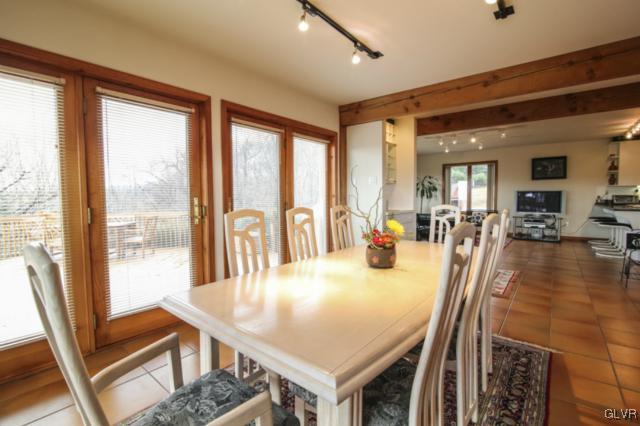 1205 Seifert Road Nazareth, PA 18064 - Photo 7 of 50 a view of a dining room with furniture and a large window