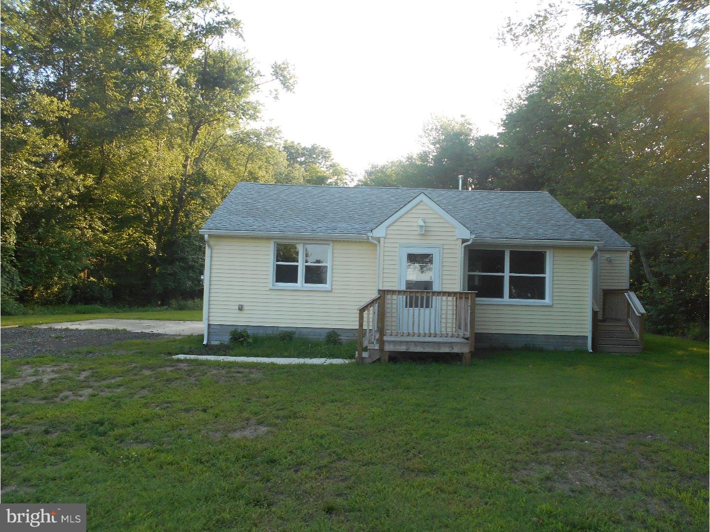 57 Carranza Road Tabernacle, NJ 08088 - Photo 3 of 3 a front view of a house with a garden