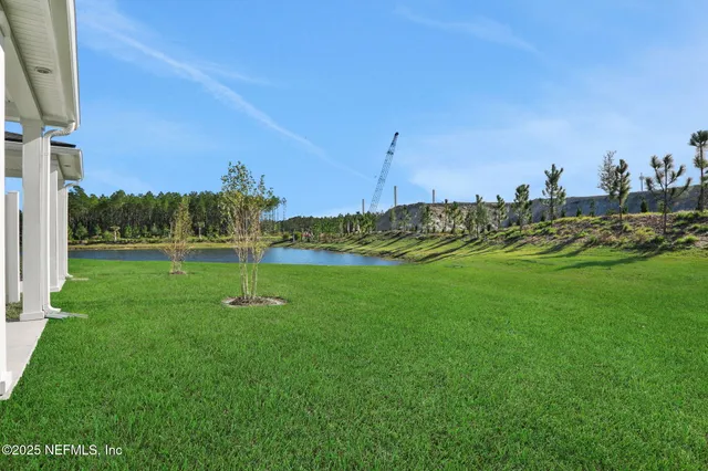 a view of a golf course with a lake