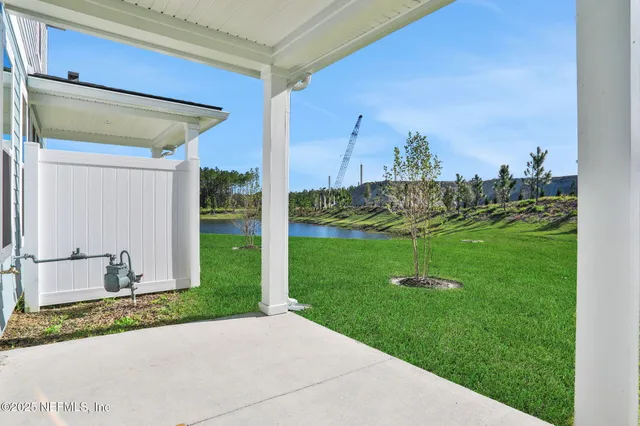 a view of a back yard of the house