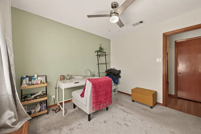 a bedroom with a bed and a walk in closet