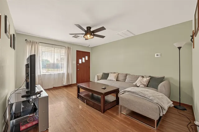 a view of a livingroom with furniture and window