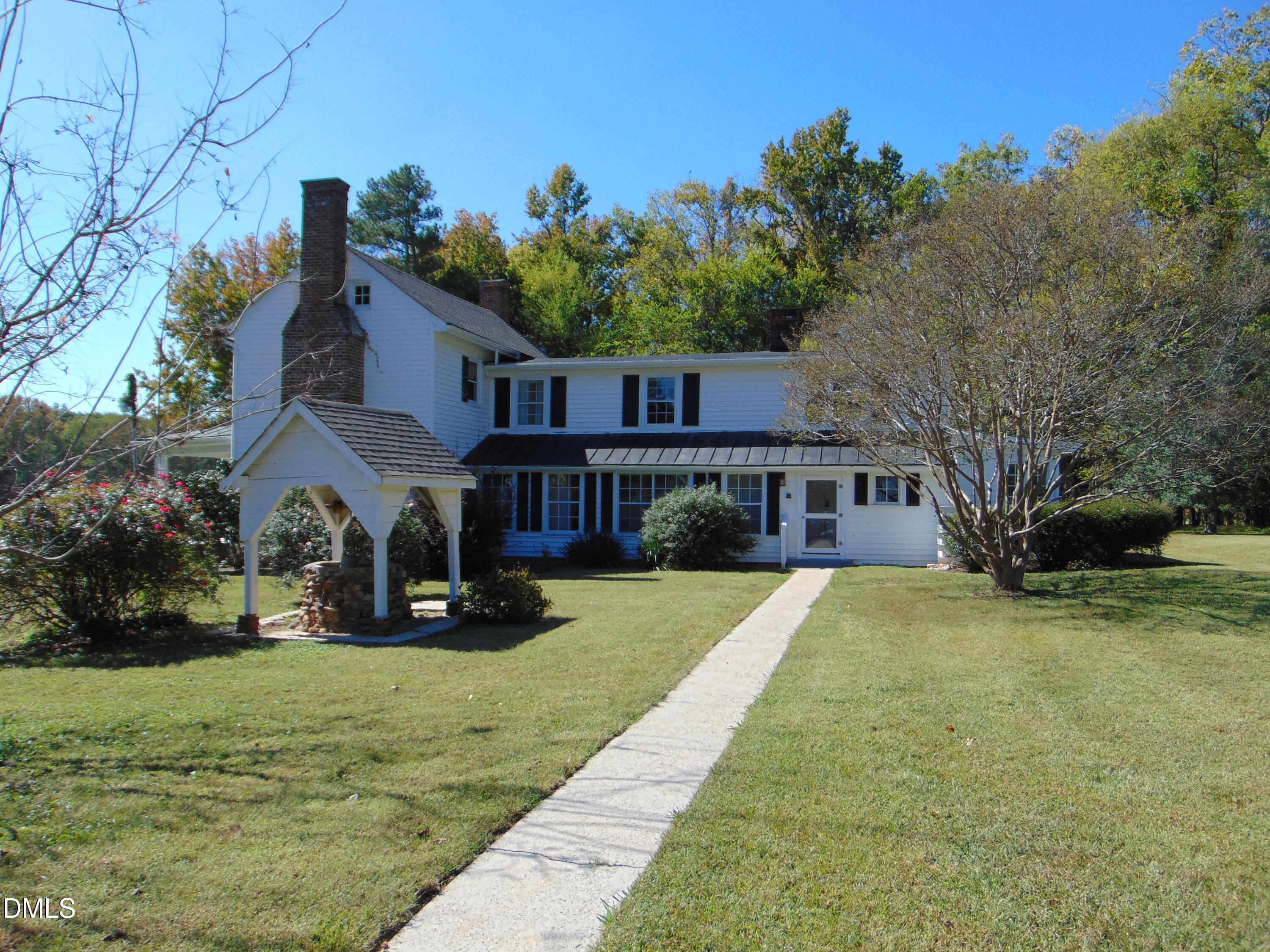 4067 Chewning Road Oxford, NC 27565 - Photo 36 of 82 a view of house with outdoor space and swimming pool