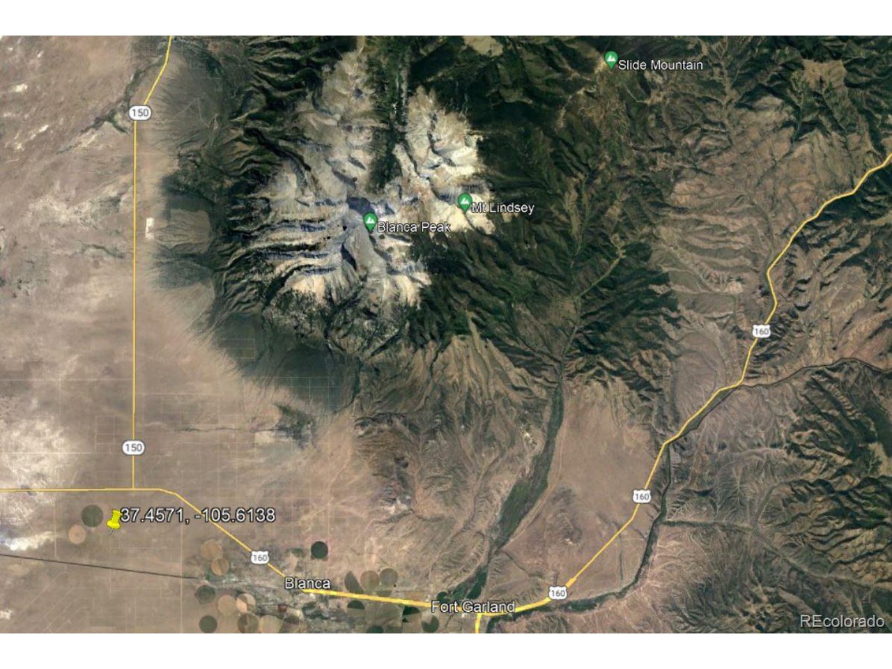 2 Gunnison Road Blanca, CO 81123 - Photo 20 of 21 a black and white photo of a lake