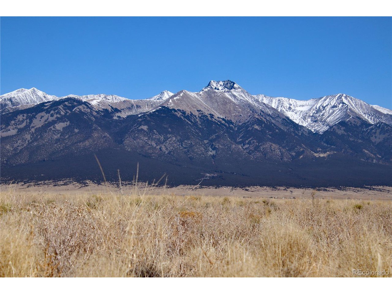 2 Gunnison Road Blanca, CO 81123 - Photo 2 of 21 a view of a large mountain with mountains in the background