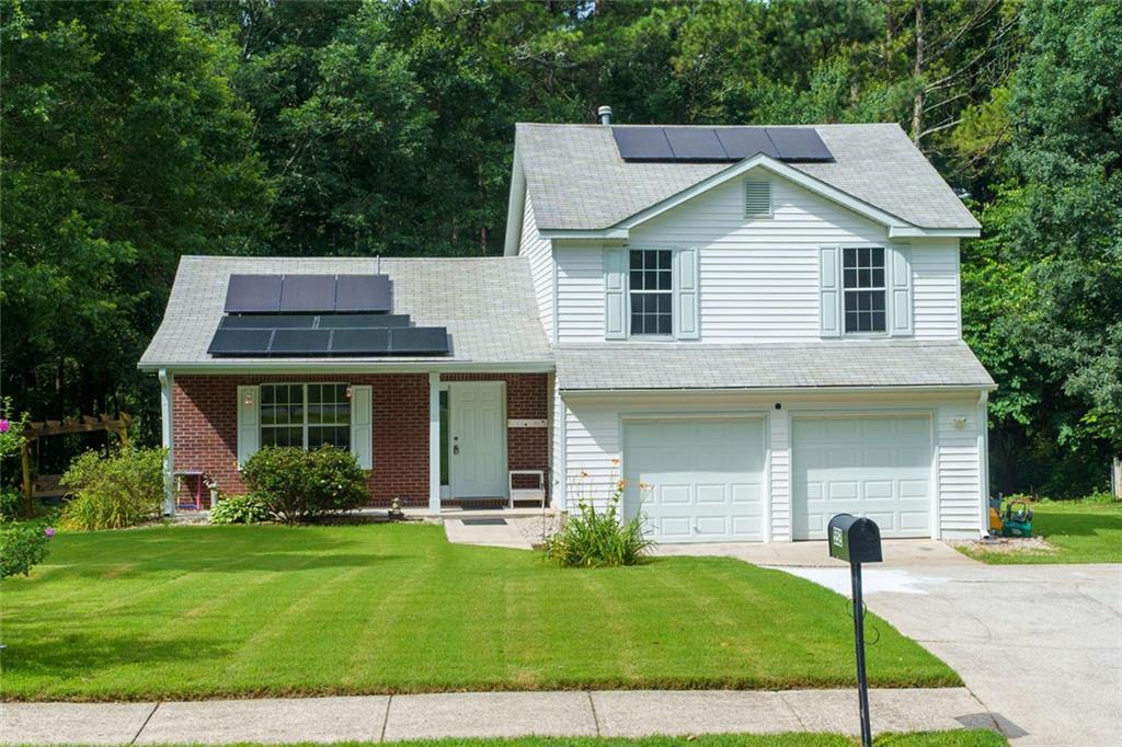 552 Casey's Crossing Winder, GA 30680 - Photo 21 of 26 a front view of a house with a yard