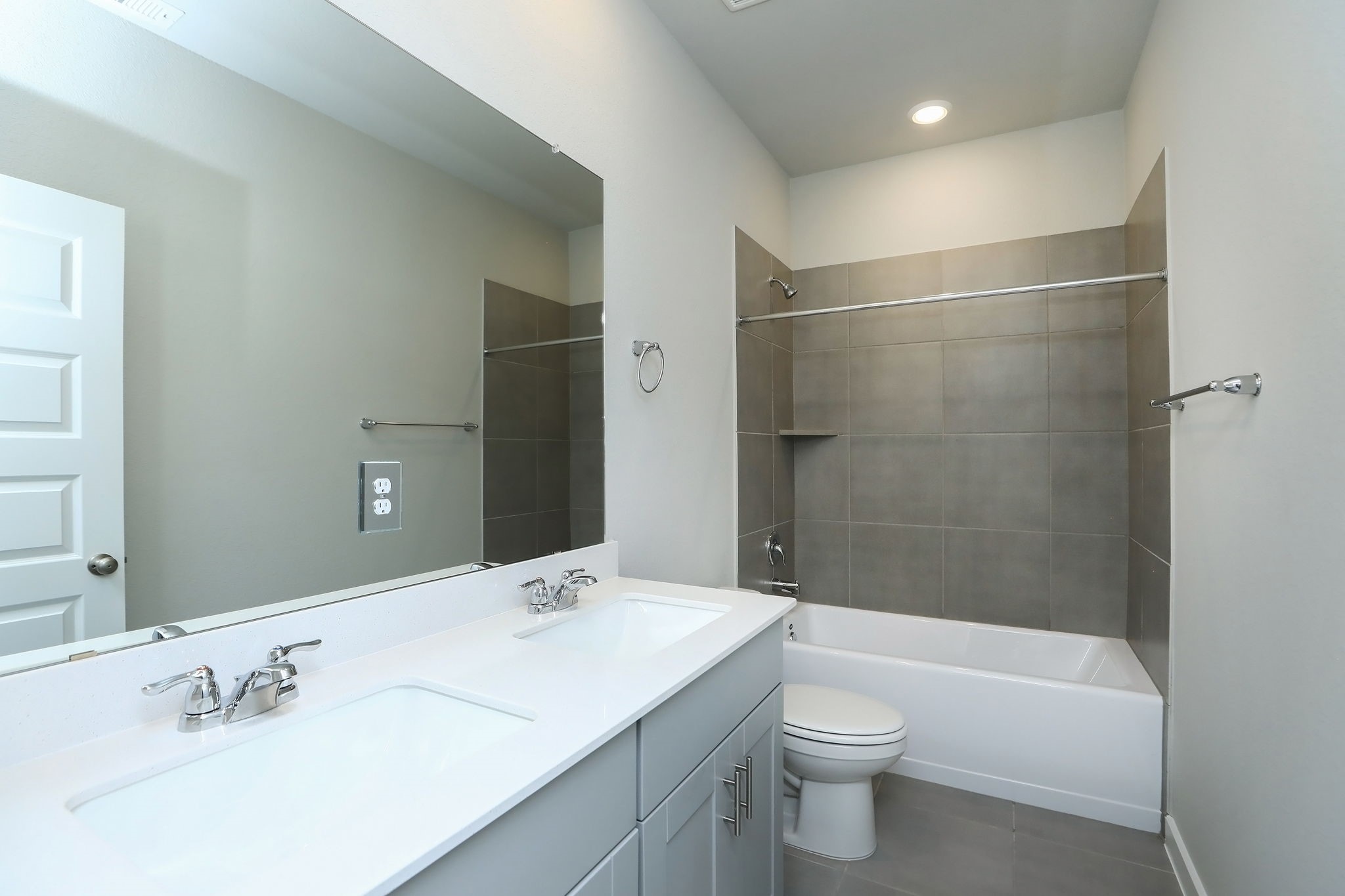 14110 Greystone Ter Street Magnolia, TX 77354 - Photo 14 of 34 This Large Secondary Full Bath Is Conveniently Situated Near Two Secondary Bedrooms And The Bonus Room. Note The Dual Sinks That Will Help Make Mornings Run A Bit More Smoothly.