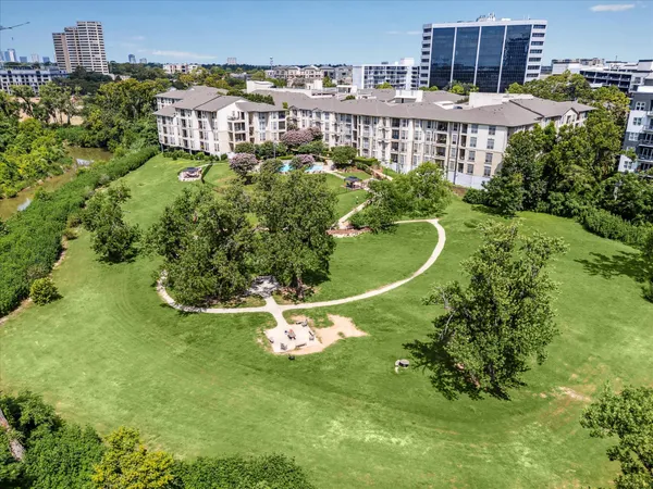 a aerial view of a house with a garden and plants