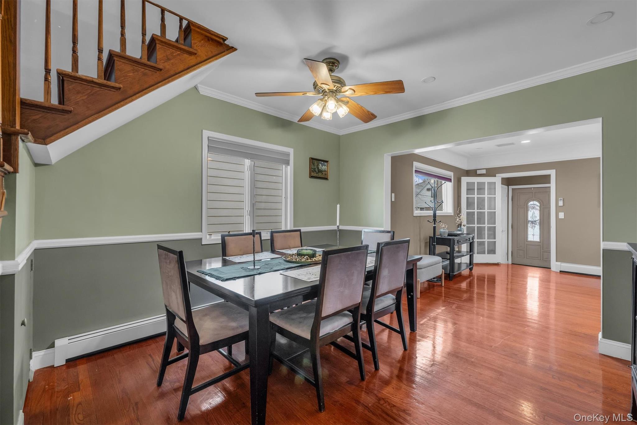 95 Liberty Boulevard Valley Stream, NY 11580 - Photo 5 of 17 a view of a dining room with furniture and wooden floor