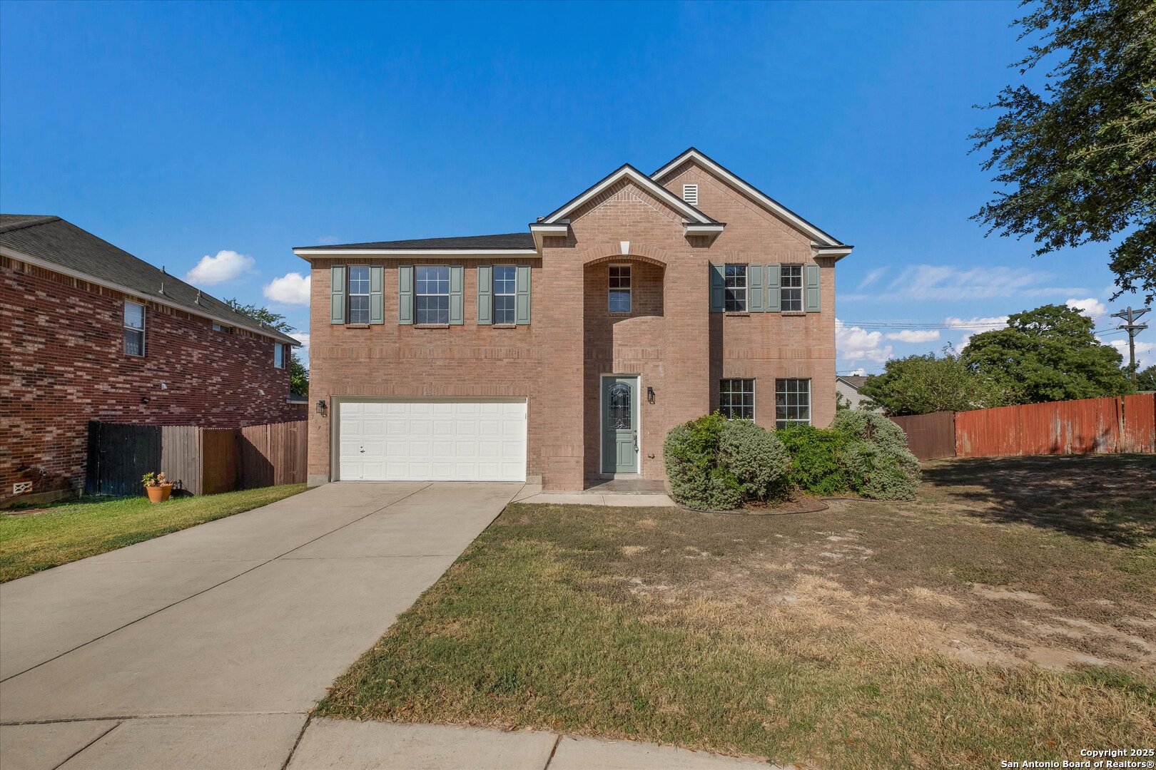 173 Springtree Gate Cibolo, TX 78108 - Photo 22 of 23 a front view of a house with a yard