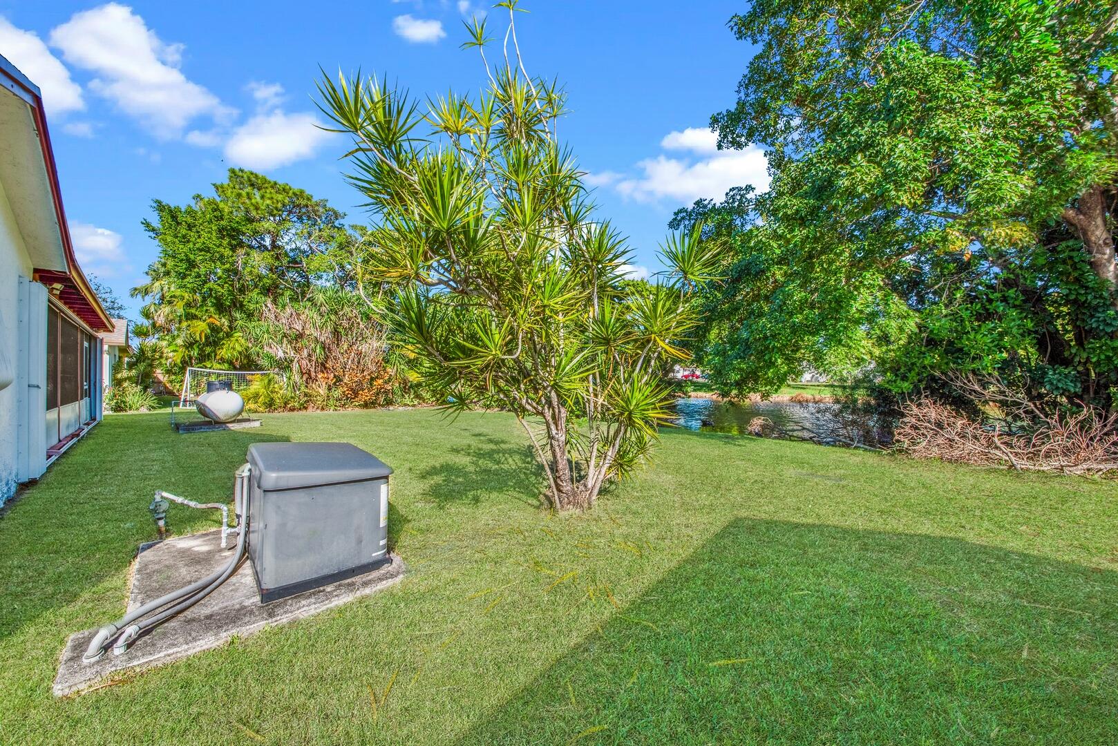22602 Southwest 54th Way Boca Raton, FL 33433 - Photo 21 of 23 a garden view with a seating space
