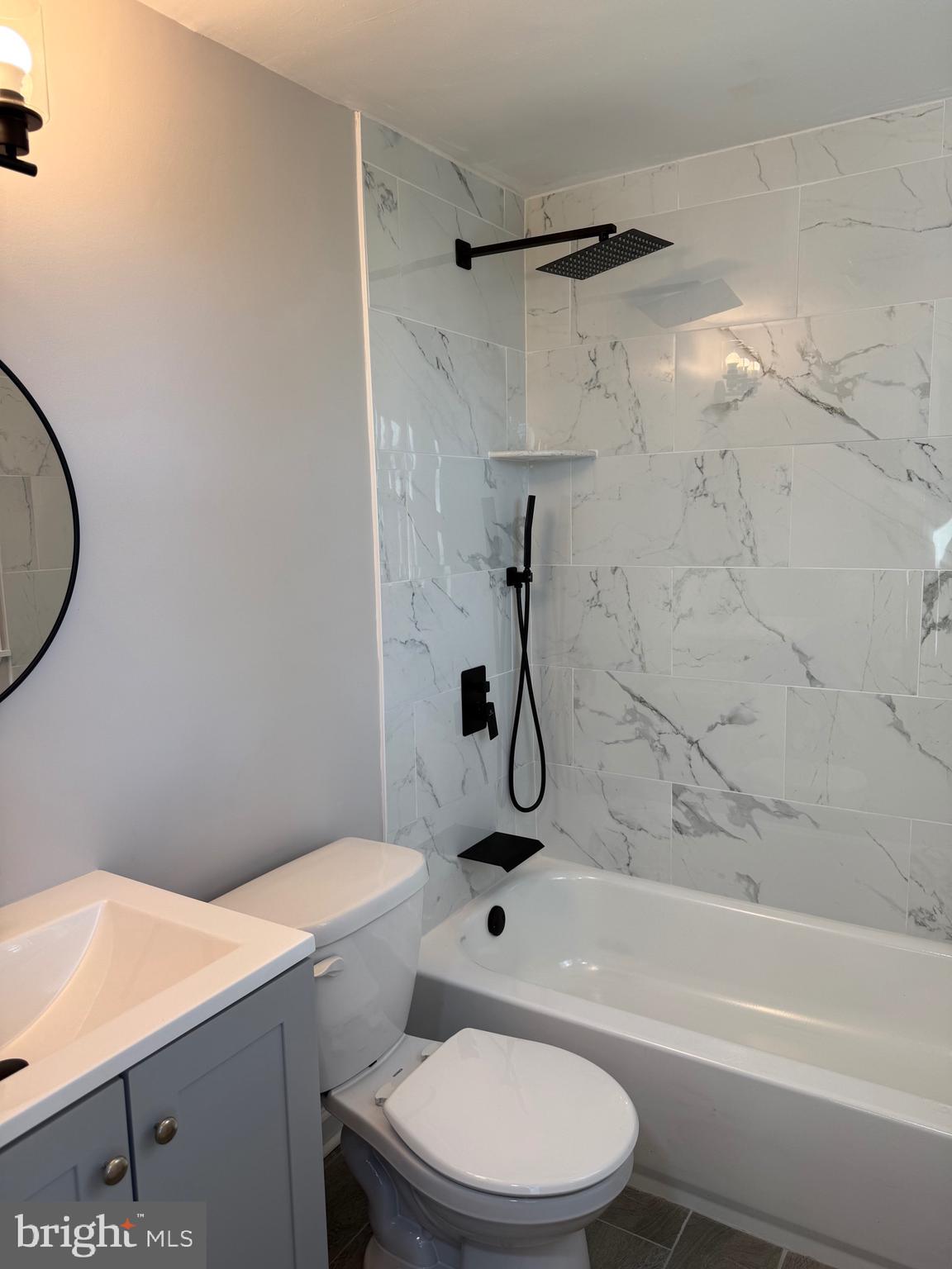 723 Parklane Road Swarthmore, PA 19081 - Photo 5 of 11 a bathroom with a toilet and a shower