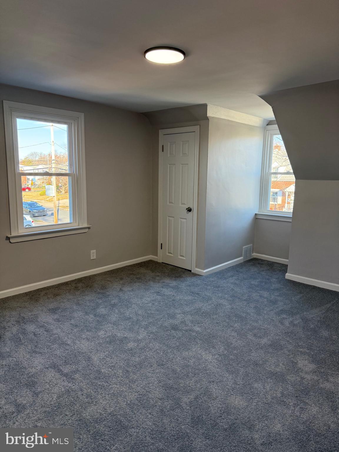 723 Parklane Road Swarthmore, PA 19081 - Photo 7 of 11 an empty room with a window