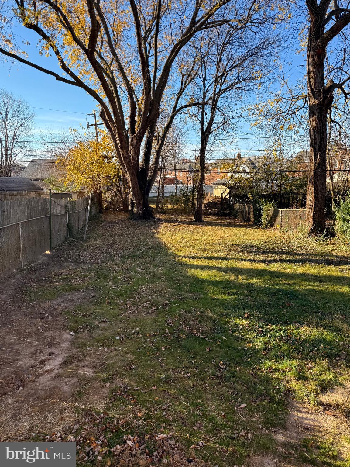 723 Parklane Road Swarthmore, PA 19081 - Photo 10 of 11 a view of a yard with yellow lighting