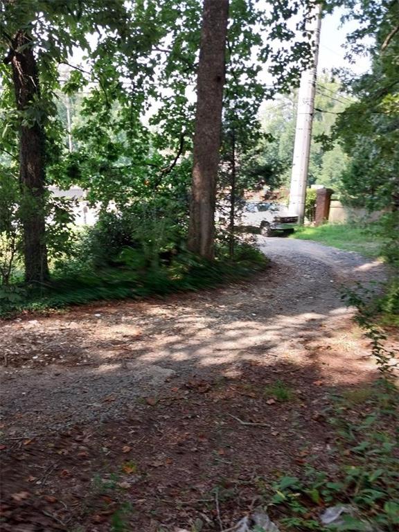 2672 Roswell Road Marietta, GA 30062 - Photo 13 of 17 a backyard of a house with lots of green space