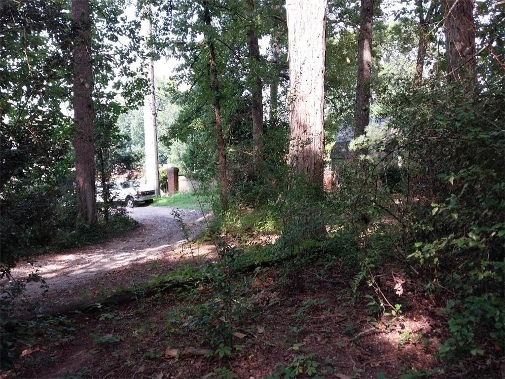 2672 Roswell Road Marietta, GA 30062 - Photo 17 of 17 a backyard of a house with lots of green space