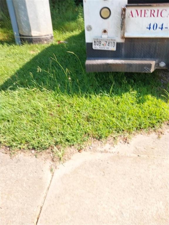 2672 Roswell Road Marietta, GA 30062 - Photo 2 of 17 a view of a street with a sign board